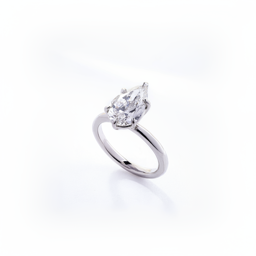 Pear Diamond Solitaire Engagement Ring in Platinum